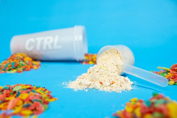 white plastic cup with white powder