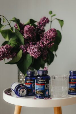 a vase with purple flowers